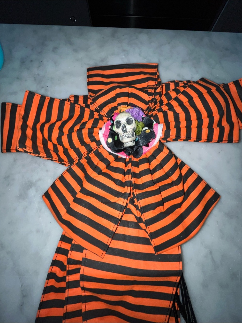 Orange and Black Striped Bow Belt Accent with Decorative Skull
